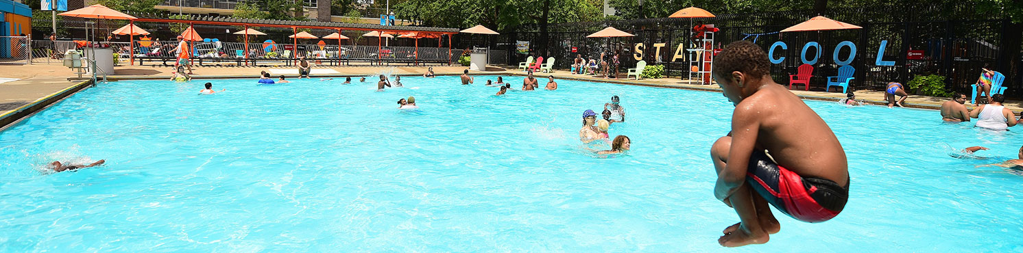 Swimmers enjoy sunny day in Dry Dock Pool