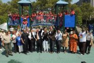 Cutting the ribbon at Story Playground 