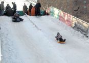 Sledding down the snow flume 