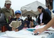 Cutting out a kite at a workshop 