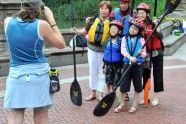 A photo shoot of a family of kayakers  