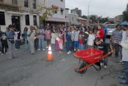 At the starting line of a wheelbarrow race 