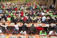 Scores of competitors concentrate on the game 