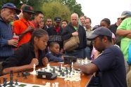 A crowd gathers to watch a match 