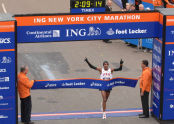 Meb Keflezighi crosses the finish line 