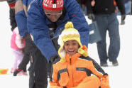 Sledding in the snow field 