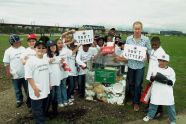 John McEnroe and Youth Athletes at the Randall's Island Sports Fields Ribbon Cutting 