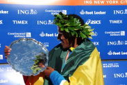 Gebre Gebremariam with Plaque 