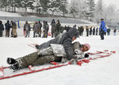 A woman plays as someone in danger while a trainee does his best to help. 