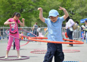 Kids hula hooping at Steet Games. 