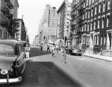 Boys Playing Stickball 