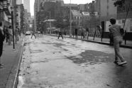 Men Playing Stickball on Thompson Street 