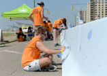 Volunteering to Paint the Barriers at Shore Road in Rockaway Beach 