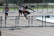 Hurdling at the PSAL season opening meet 