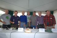 Posing with the anniversary cake 